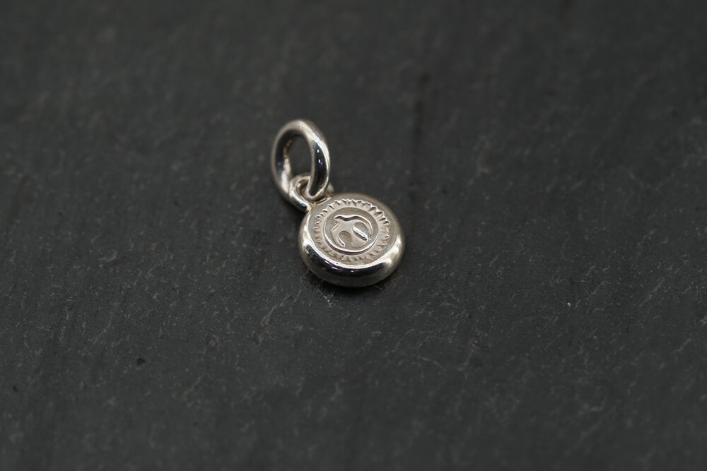 Small Silver Sun Charm (w/ silver eagle stamp) - Cotton Sheep Japanese silver jewelry Goro Takahashi inspired jewelry Native American Japanese Jewelry Gold and Silver Japanese Jewelry Goros Jewelry Masato San Jewelry Masato San Jewelry Artist
