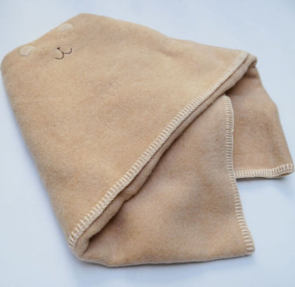 Fuzzy Baby Blanket A cozy, soft and fuzzy cotton blanket with the choice of a small bear face or rabbit face~  Available in brown bear or white rabbit 100% Organic cotton  30.7in x 30.7in  Made in Japan 