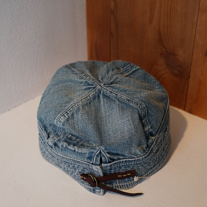 Kapital Denim Old Man and the Sea Crush Remake Cap 11.5oz This cap features a unique wear-and-tear look as a softer version of the classic "Old Man and the Sea" cap, with damage processing and decorative stitching repairs. Each hat carries its own sense of individuality.