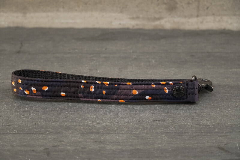 Porter PS Chip Camo Pouch About PS Chip Camo Series The ‘PS Chip Camo’ series is an original PORTER textile design inspired by camo print created for the desert environment in the 1980’s , characterized by the addition of pebbles . The camo print is also unique for its subtle colorway—navy, grey and black— with a pop of orange and white pebbles.